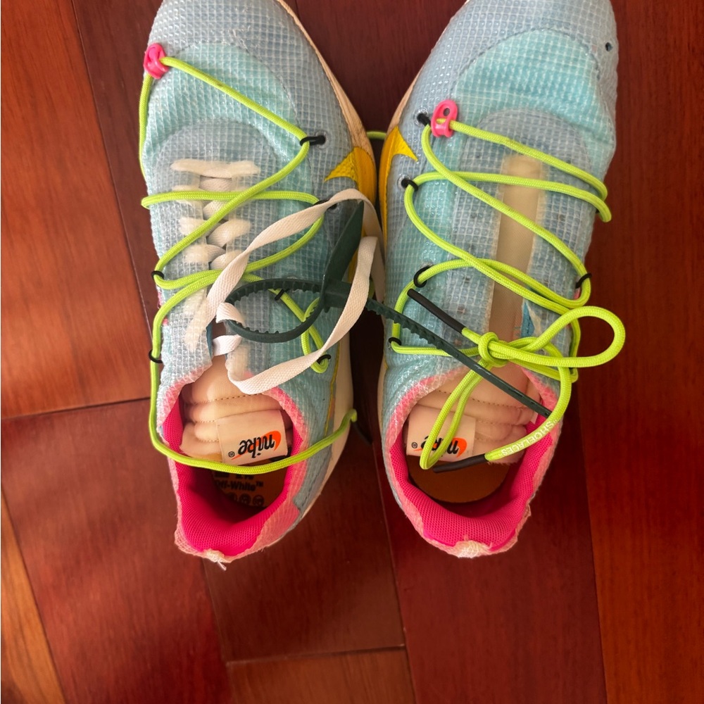 Nike Blue and Pink Athletic Shoes with Modern Silhouette